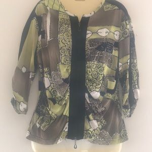 Blouse with designs. Zip up.